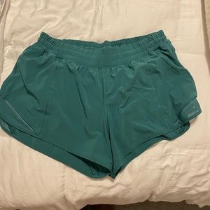 Turquoise Lululemon Hotty Hot shorts 4 inch